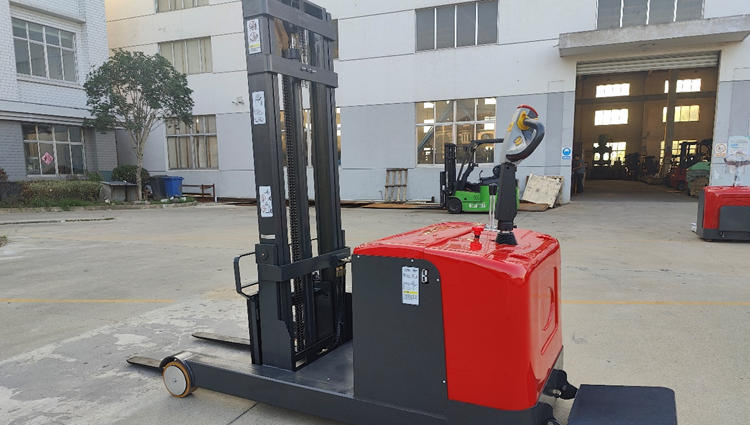 What is a stacker truck and what types are it divided into?