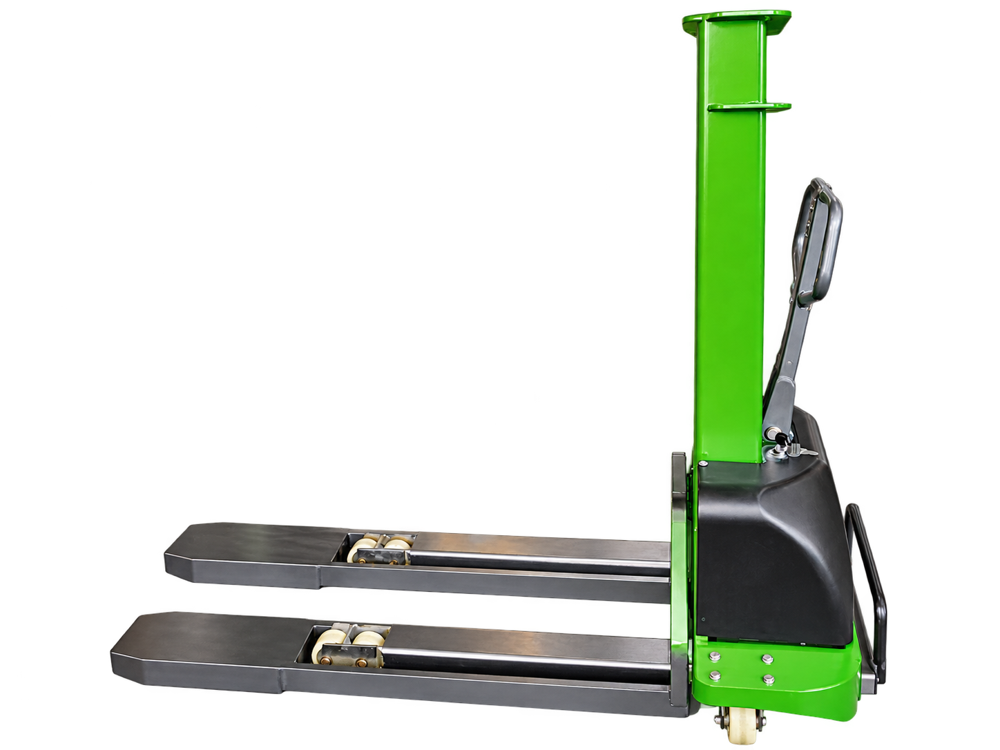 Semi-electric self-loading stacker side view with forks facing left
